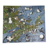 A completed jigsaw puzzle depicting an illustrated map of Nova Scotia and the surrounding Atlantic Ocean, with white seagull cutouts layered across the front.