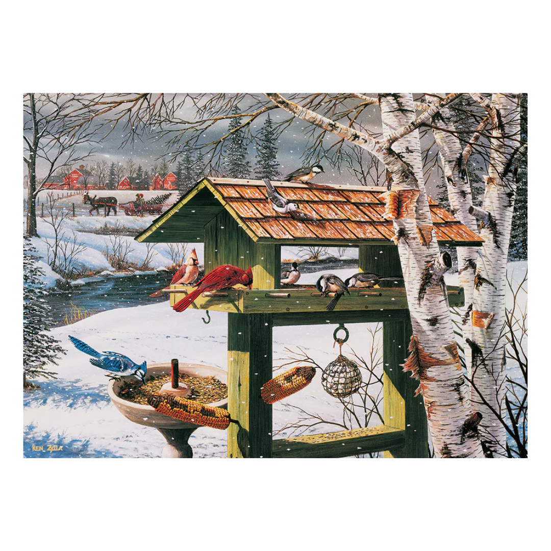 Bird feeder with birds on a snowy landscape