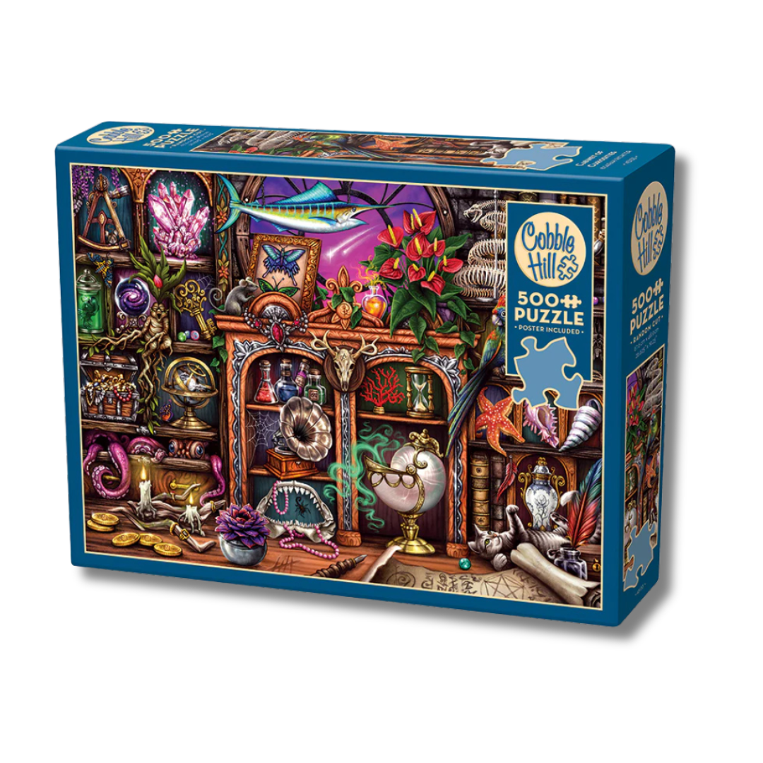 Cobble Hill puzzle box with a colorful illustration of a curio cabinet on a white background