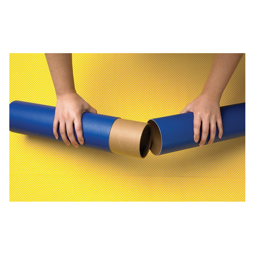 Person unrolling a blue and brown roll of paper on a yellow surface