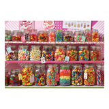 Display of colorful candy jars with a 'Candy Shop' theme.