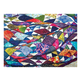 Colorful quilt with geometric pattern on a white background