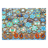 Colorful Hanukkah-themed cookies with stars, candles, and dreidels on a blue background