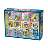 Jigsaw puzzle box with colorful window scene design on a white background