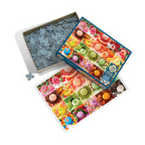 Colorful puzzle with a partially completed design and packaging on a white background