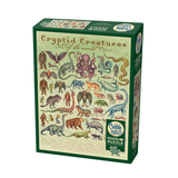 A 1000 piece jigsaw puzzle box titled 'Cryptid Creatures Of The World' by Cobble Hill Puzzles. The box features a green border and a central cream-coloured panel filled with various colourful illustrations of cryptids, monsters, and mythical creatures.