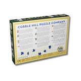 Cobble Hill Puzzles - Village Tree 1000 Piece Puzzle - Large Box - The Puzzle Nerds  