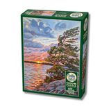 Jigsaw puzzle box with a scenic sunset design on a white background