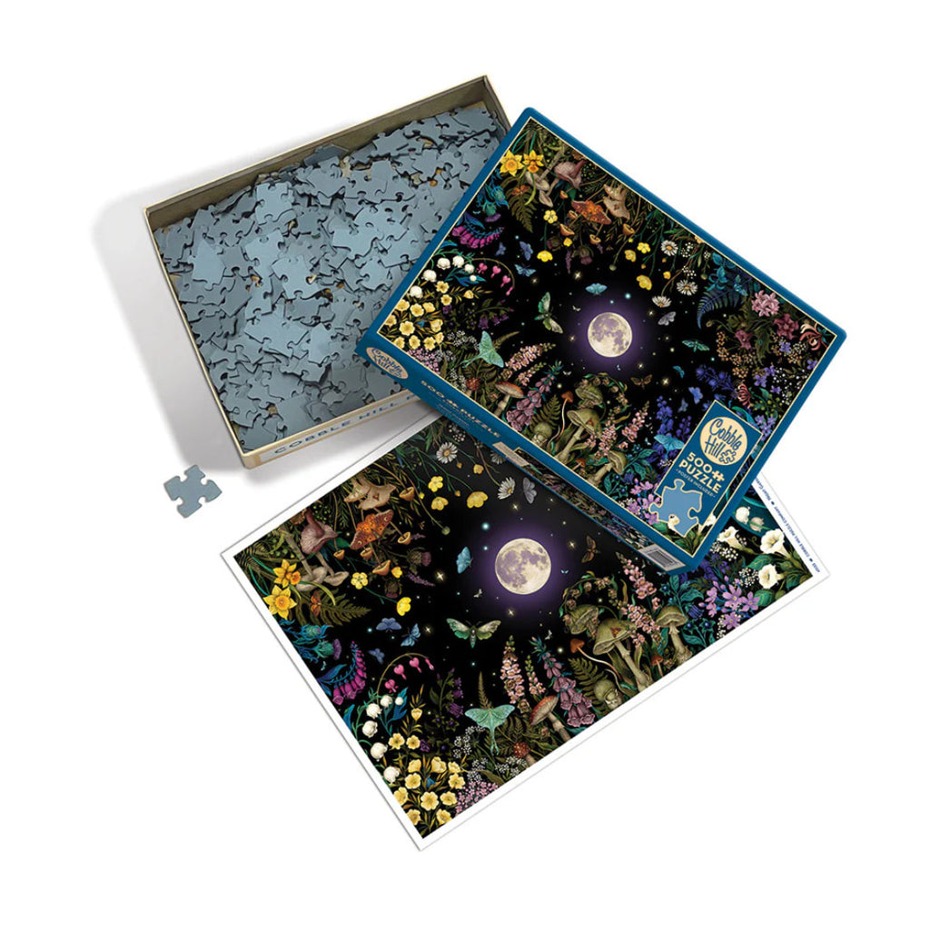 Jigsaw puzzle set with a fantasy design featuring a moon and nature elements, partially completed.