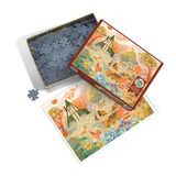 Jigsaw puzzle set with colorful packaging and pieces on a white background