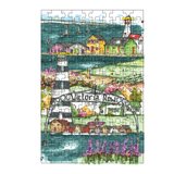 Jigsaw puzzle with a colorful illustration of a coastal scene featuring houses and a lighthouse.