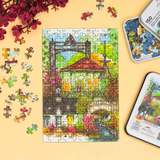 Colorful puzzle with a partially completed scene on a yellow background, surrounded by puzzle pieces and packaging.