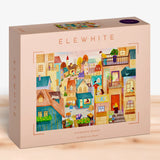 Puzzle box with colorful illustration of a village scene and 'Elewhite' branding.