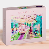 Puzzle box with 'Elewhite' branding and a scenic illustration of a Japanese street with cherry blossoms.