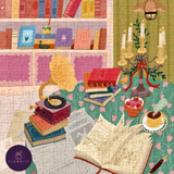 A completed jigsaw puzzle featuring a cozy illustrated scene with books, a gramophone, candles, a cupcake, and an open book on a patterned tablecloth, with a bookshelf in the background. A circular 'ELEWHITE' logo appears in the lower-left corner.