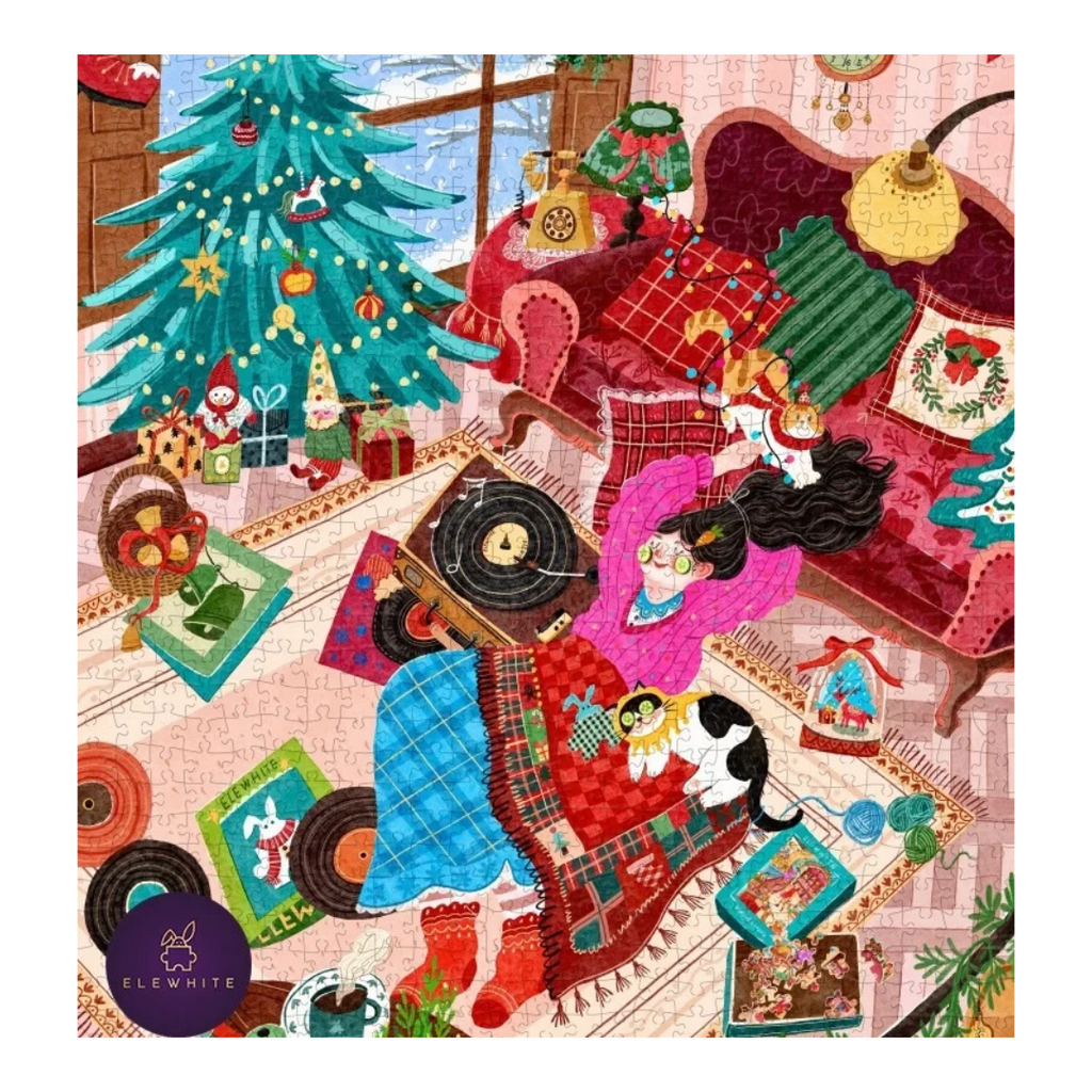 A colorful jigsaw puzzle featuring a cozy, whimsical Christmas living room scene with a decorated tree, red velvet sofa, wrapped gifts, records, and a woman in a pink coat. The puzzle is shown assembled with a small circular 'ELEWHITE' brand logo in the bottom-left corner