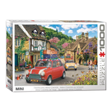 Jigsaw puzzle box featuring a scenic village with a red Mini Cooper car on a white background