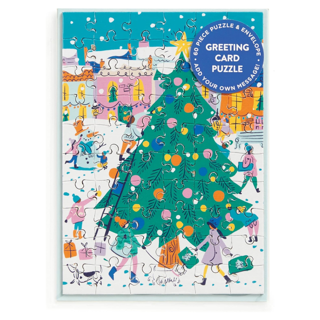 Greeting card puzzle with a Christmas tree design on a white background