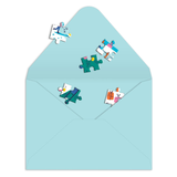 Light blue envelope with colorful puzzle pieces on a white background