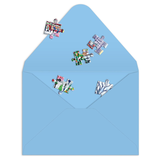 Set of colorful puzzle pieces on a blue envelope