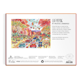 The back cover of a 1000-piece flat puzzle titled 'Leaf Peeping' by Michael Storring3, featuring a colorful illustration of autumn trees and cars, product details, and a rose gold border on a white background.