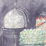 Jigsaw puzzle with cake illustrations and text on a blue background