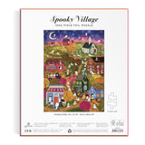 The back of a Joy Laforme Spooky Village Puzzle box  features an adorably ghostly village on a spooky Halloween night