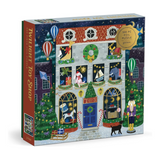 Twilight Toy Shop 500-piece foil puzzle box featuring a whimsical Christmas night scene with a toy shop facade, hot air balloons, a nutcracker, and holiday decorations.