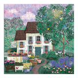 Jigsaw puzzle with a colorful scene of a house and garden