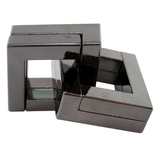 Two metallic square objects on a white background