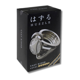 Huzzle cast ring II packaging on a white background