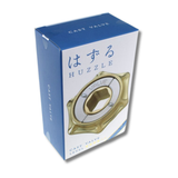 Box of Huzzle cast valve  metal hand puzzle with blue and white design