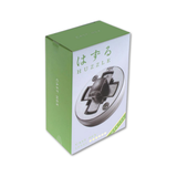 Box of Huzzle puzzle game with green and white design
