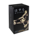 Box of Huzzle puzzle by Cast Trinity on a white background