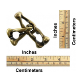 Brass hand puzzle with measurements in inches and centimeters on a white background