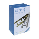 Box of Huzzle cast keyhole level on a white background