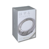 HUZZLE product packaging with a silver ring on a white background