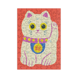 Jigsaw puzzle with a cat design on a red background