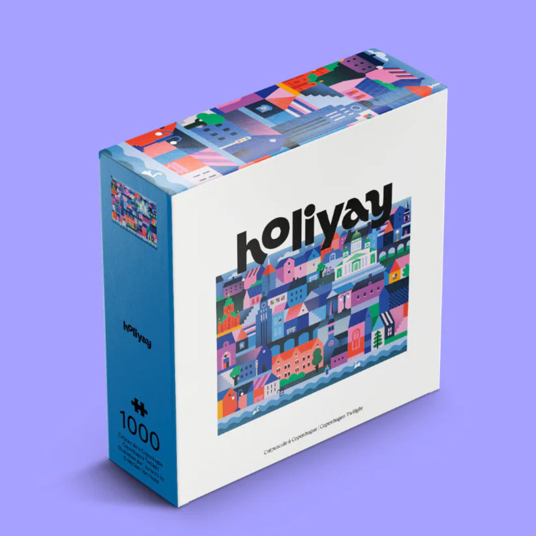 Hollyyay puzzle box with colorful design on a purple background