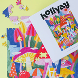 Colorful mushroom-themed puzzle with a magazine titled 'holiyay' on a yellow background
