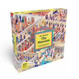 The World of The Museum jigsaw puzzle box, featuring a highly detailed, colorful isometric illustration of a museum interior with numerous tiny figures. The box is shown at a three-quarter angle on a clean white background.