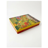 A 1000-piece jigsaw puzzle box featuring a colorful autumn forest scene with red, yellow, and green foliage, set against a plain white background.