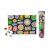 Colorful sticker set with a tube and scattered stickers on a white background