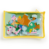 Children's puzzle with animal illustrations in a clear plastic bag on a white background