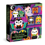 A 300-piece jigsaw puzzle box by the brand mudpuppy, titled 'Glow in the Dark Haunted House Cats'. The packaging features a colorful illustration of various cute, spooky cats in Halloween costumes inside a haunted house at night.