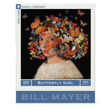 Jigsaw puzzle packaging featuring a woman with butterflies on her head, titled 'Butterfly Girl' by Bill Mayer.