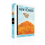 A jigsaw puzzle box featuring The New Yorker cover art from October 1959, with a dog jumping in a pile of orange and yellow autumn leaves. The box is branded New York Puzzle Company and labeled 1000 pieces.