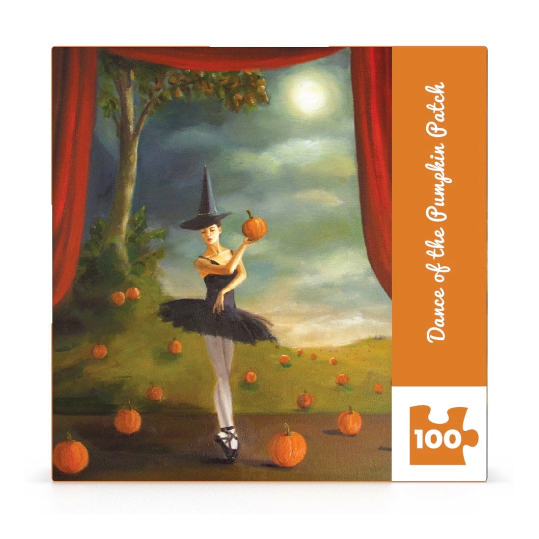 Jigsaw puzzle box featuring a witch holding a pumpkin in a pumpkin patch with red curtains.