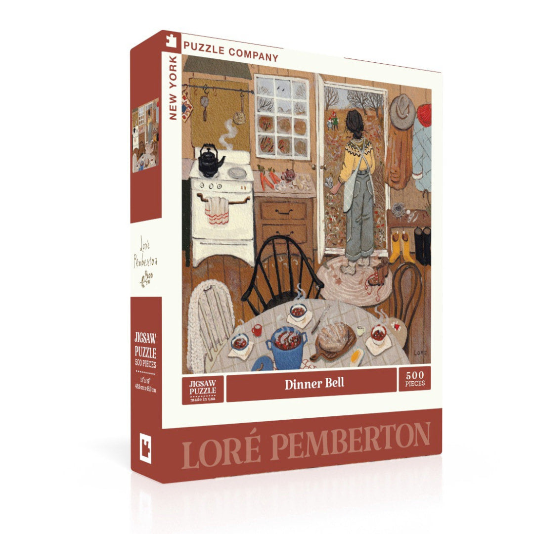 Jigsaw puzzle box featuring a kitchen scene with a woman and children, titled 'Dinner Bell' by Loree Pemberton.