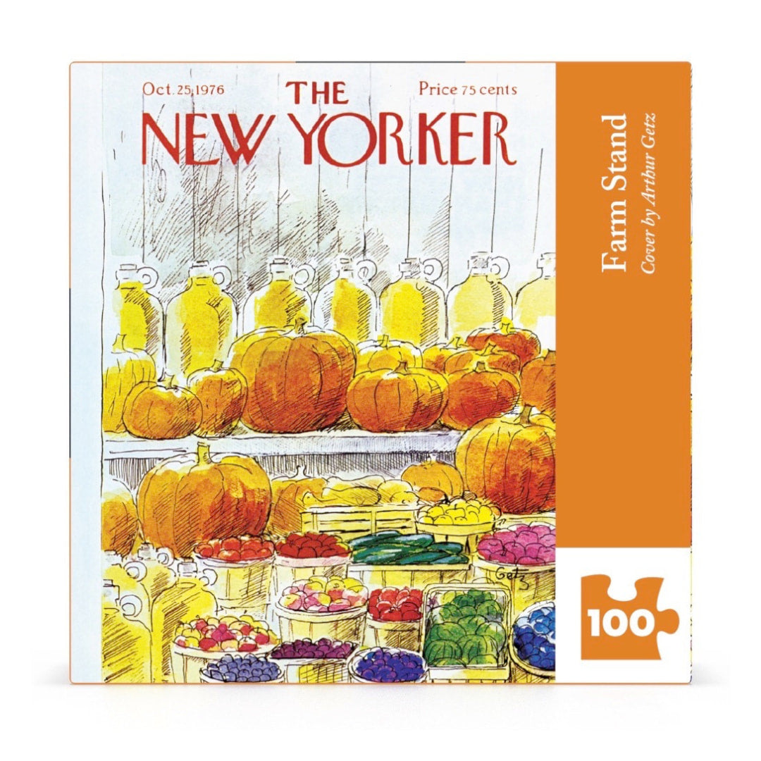Puzzle box featuring a cover of 'The New Yorker' with pumpkins and vegetables.